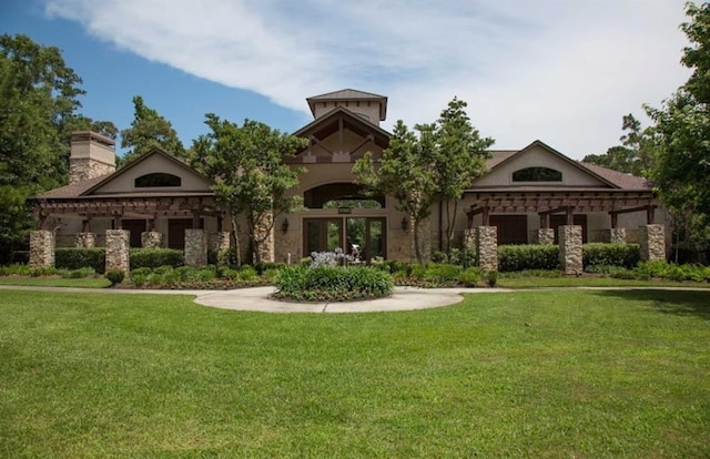 view of front of home with a front lawn