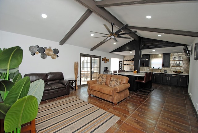 tiled living room with ceiling fan and vaulted ceiling with beams