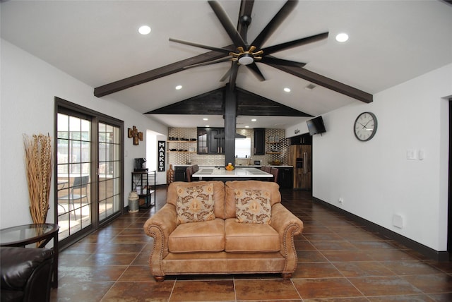 living room with lofted ceiling with beams