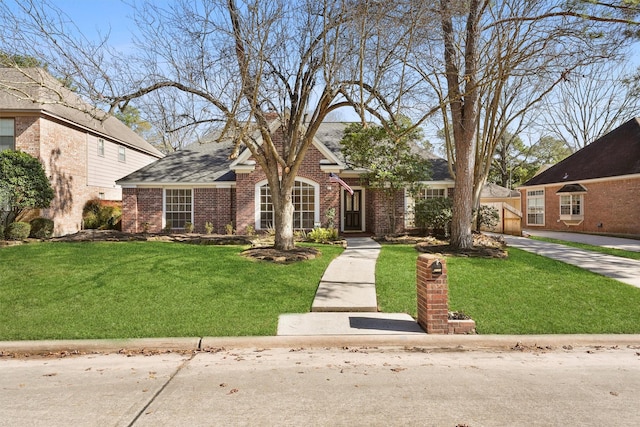 view of front of house with a front lawn