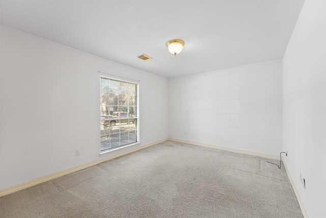 unfurnished room featuring carpet floors