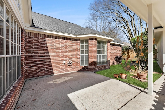 property entrance featuring a patio