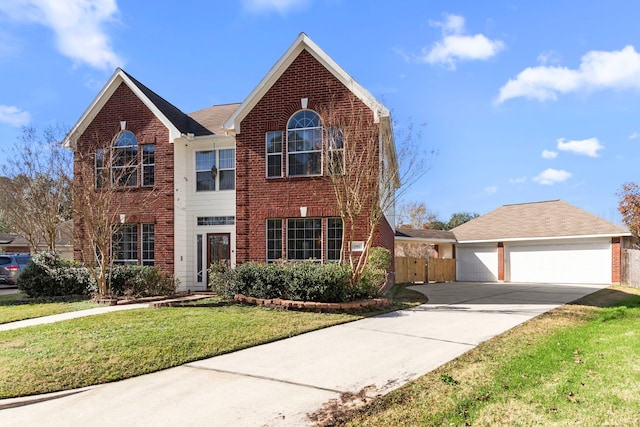 front facade featuring a garage and a front lawn