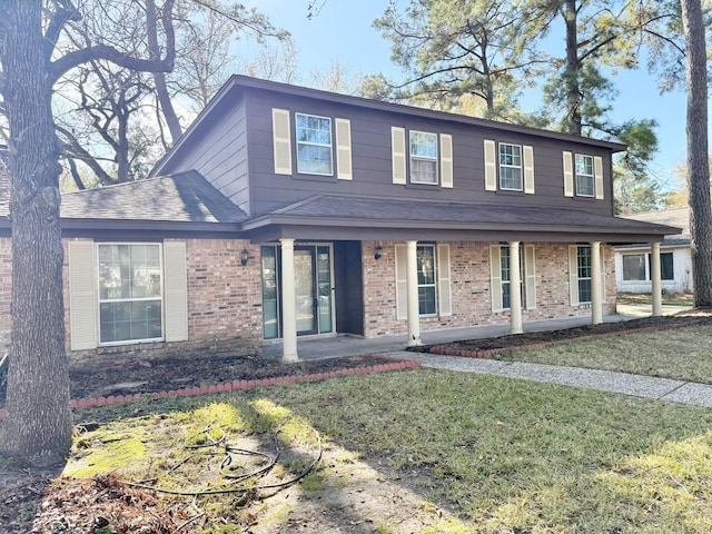 view of front of home featuring a front yard