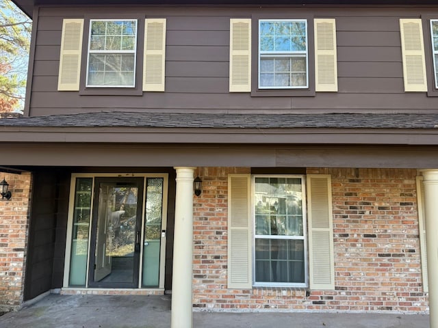 entrance to property with a porch