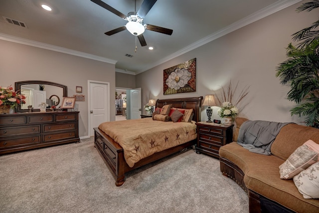 bedroom with ornamental molding, light colored carpet, and ceiling fan