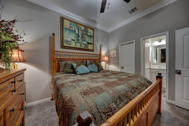 carpeted bedroom featuring ornamental molding, connected bathroom, and ceiling fan