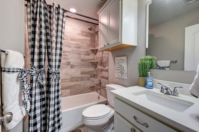 full bathroom with vanity, toilet, and shower / bath combo