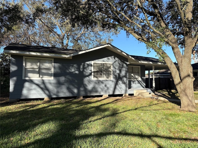 view of front of home with a front yard