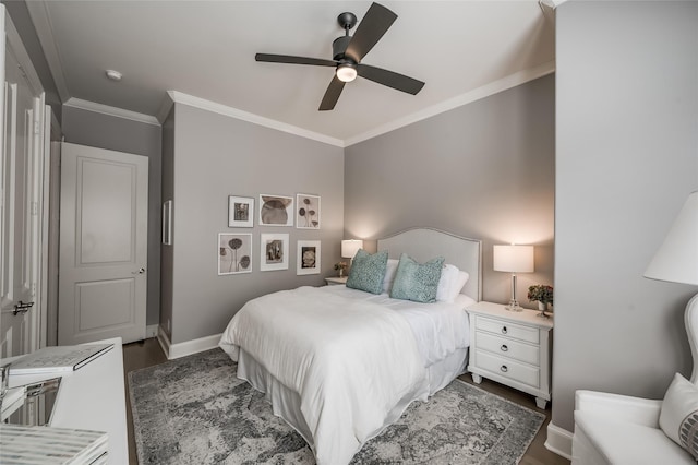 bedroom featuring ornamental molding, dark hardwood / wood-style floors, and ceiling fan