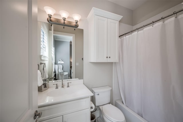 full bathroom with vanity, toilet, and shower / tub combo with curtain