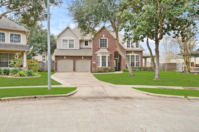 view of front of home with a garage and a front yard