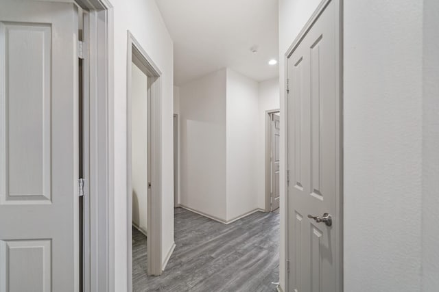 corridor featuring light hardwood / wood-style floors