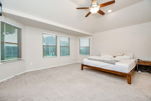 bedroom featuring vaulted ceiling, carpet flooring, and ceiling fan