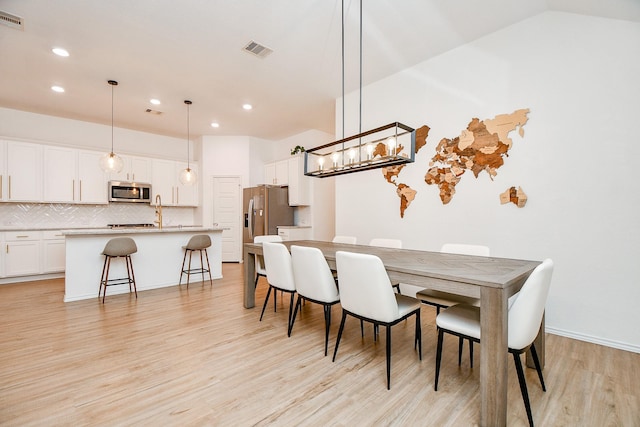 dining room featuring light hardwood / wood-style floors