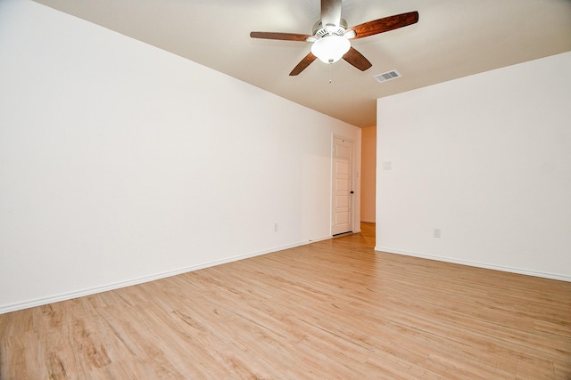 unfurnished room featuring ceiling fan and light hardwood / wood-style floors