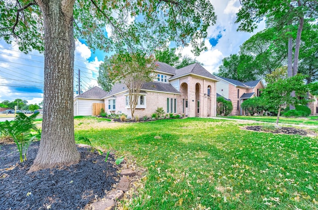 view of front of home with a front yard