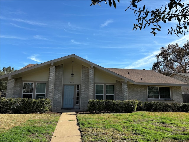 ranch-style house with a front yard