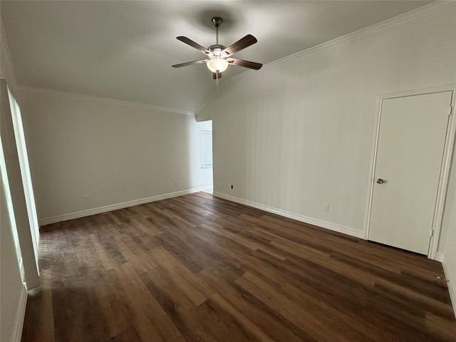 interior space with crown molding, vaulted ceiling, dark hardwood / wood-style floors, and ceiling fan