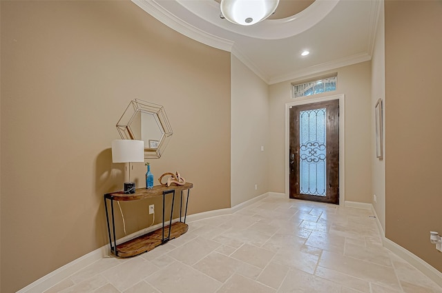 foyer entrance featuring recessed lighting, stone tile flooring, crown molding, and baseboards