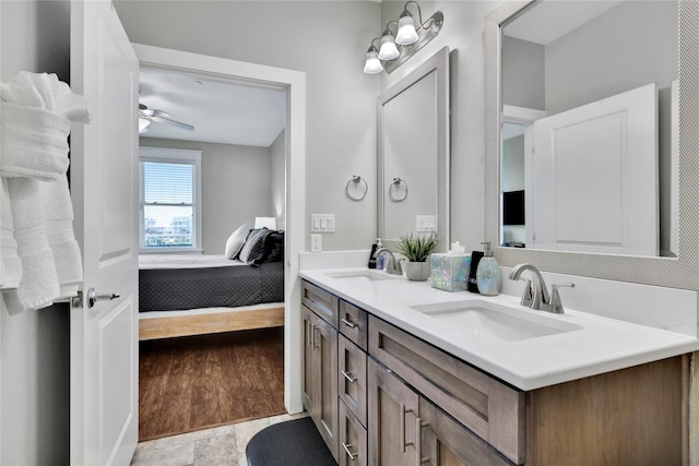 bathroom featuring vanity and ceiling fan