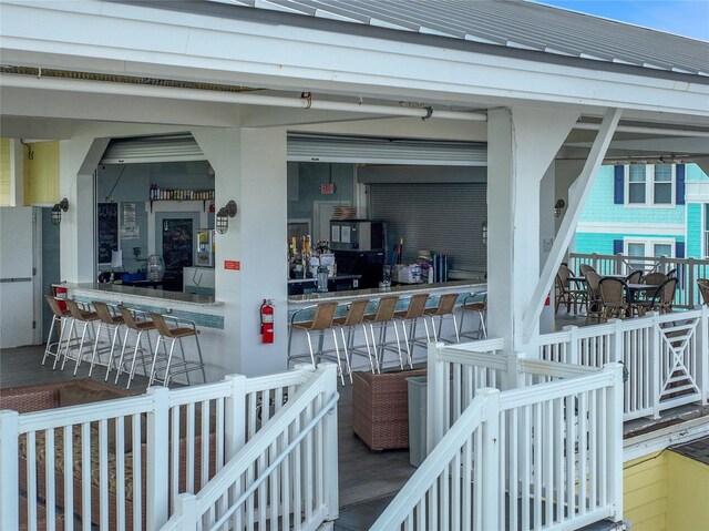 4121 Pointe W Dr Unit 102, Galveston, TX 77554 - property entrance featuring metal roof