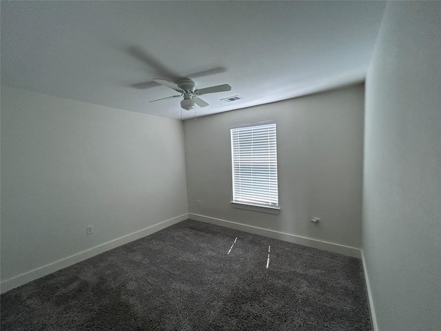 carpeted empty room with ceiling fan