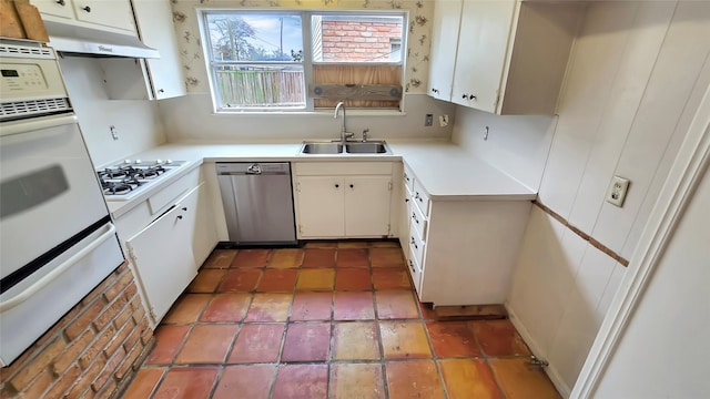 kitchen with sink, white gas cooktop, white cabinets, and dishwasher