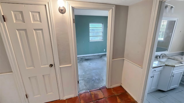 hallway featuring sink