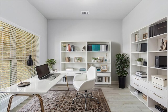 office area featuring light hardwood / wood-style floors