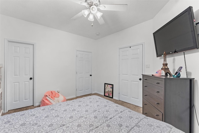 carpeted bedroom featuring ceiling fan