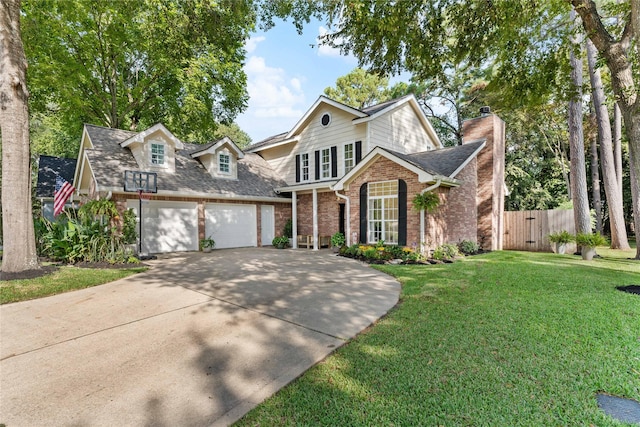 view of front property featuring a garage and a front lawn