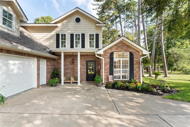 front facade with a garage