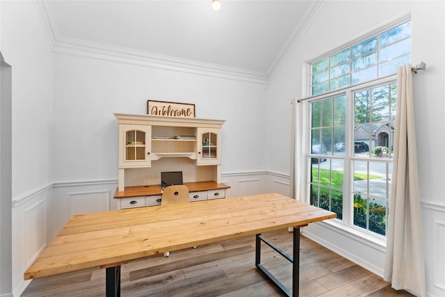 office area featuring hardwood / wood-style flooring and crown molding