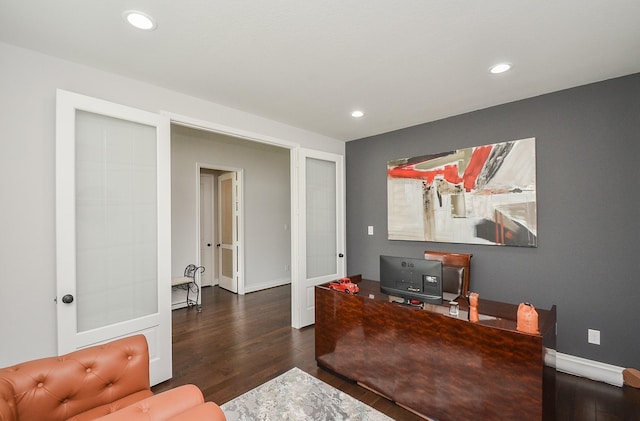 home office featuring dark hardwood / wood-style flooring