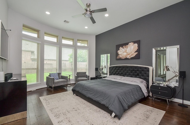 bedroom featuring dark hardwood / wood-style flooring and ceiling fan