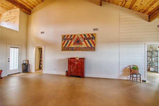 living room featuring concrete floors, visible vents, wood ceiling, beam ceiling, and high vaulted ceiling