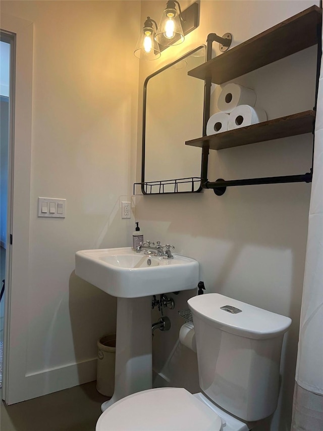 bathroom featuring toilet