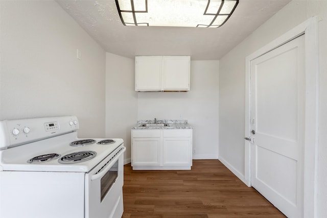 kitchen with white cabinetry, sink, dark wood-type flooring, and white electric range oven