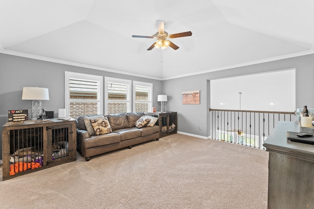 living room featuring crown molding, lofted ceiling, carpet, and ceiling fan