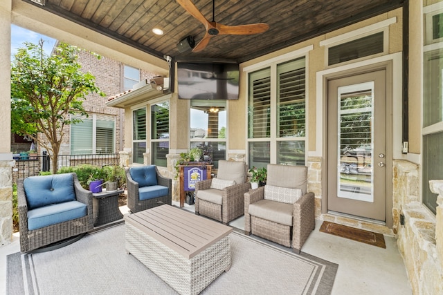 view of patio featuring ceiling fan