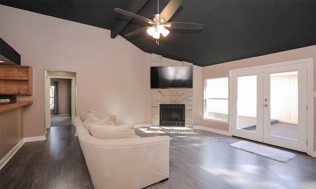 living room with a fireplace, dark wood-type flooring, and lofted ceiling with beams