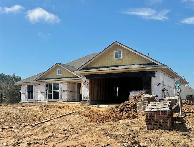 property in mid-construction featuring an attached garage