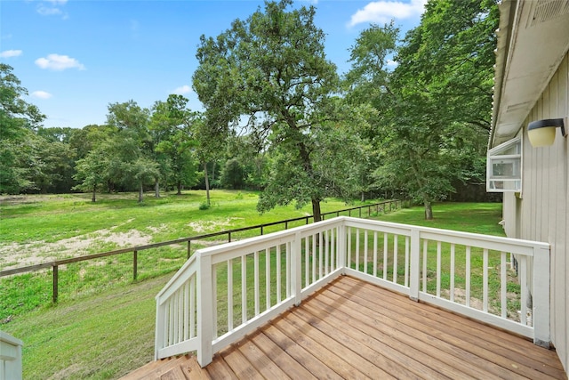 wooden deck with a yard