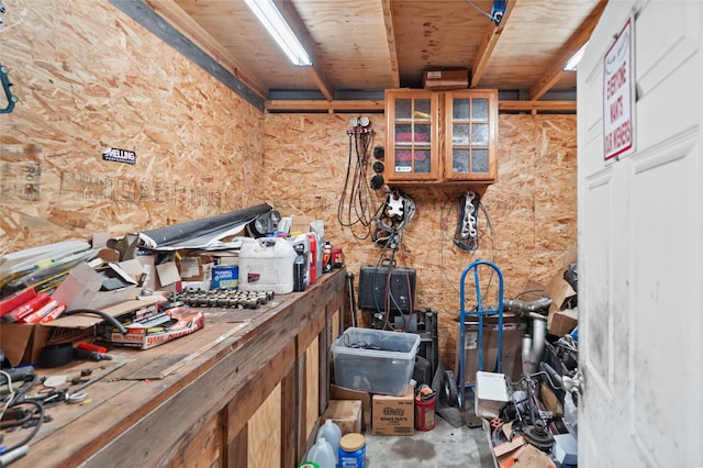 misc room with concrete flooring