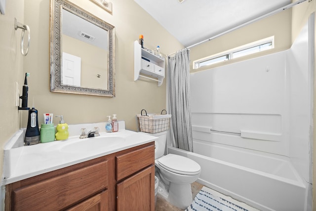 full bathroom with vanity, toilet, and shower / bath combo with shower curtain