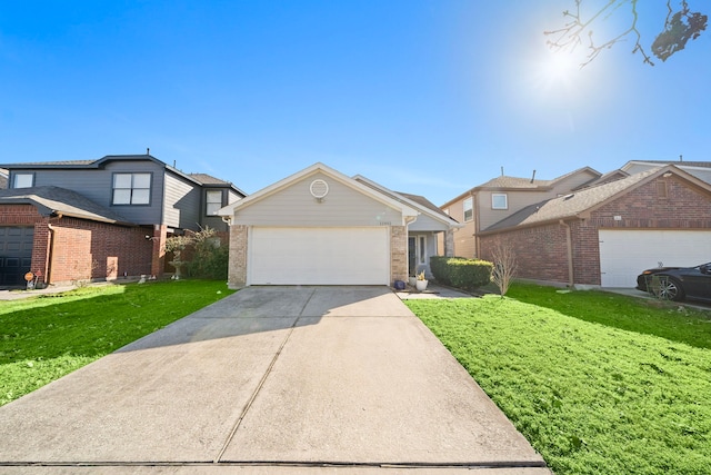 view of front of property featuring a garage and a front lawn