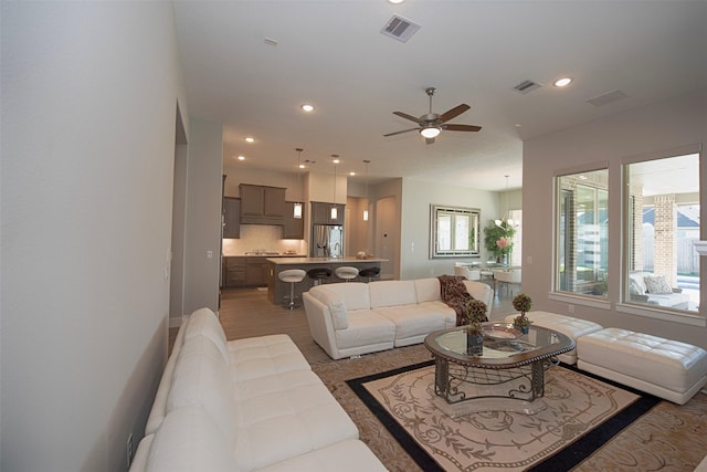 living room with ceiling fan