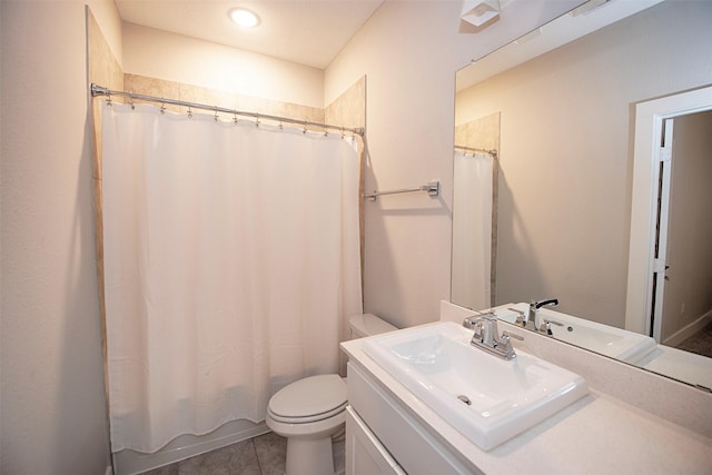 full bathroom featuring vanity, shower / tub combo, tile patterned floors, and toilet