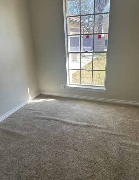 view of carpeted spare room